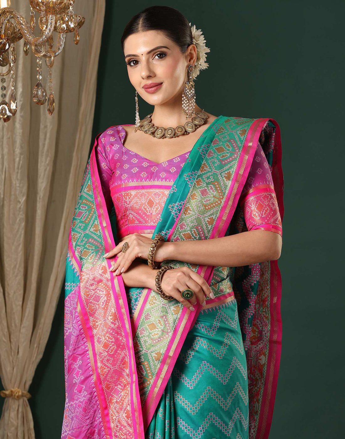 Teal Green Silk Patola Woven Saree