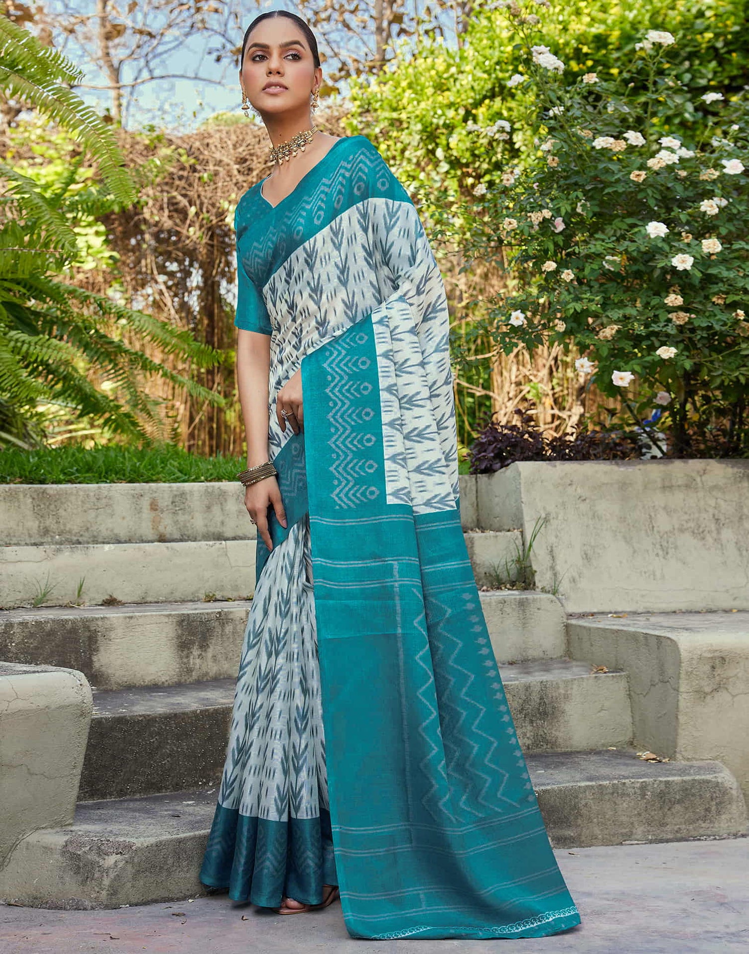 Teal Blue Cotton Blend Ikkat Printed Saree