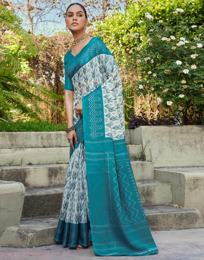 Teal Blue Cotton Blend Ikkat Printed Saree