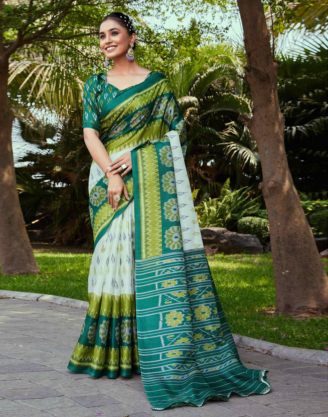 Dark Green Cotton Blend Ikkat Printed Saree