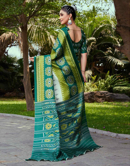 Dark Green Cotton Blend Ikkat Printed Saree