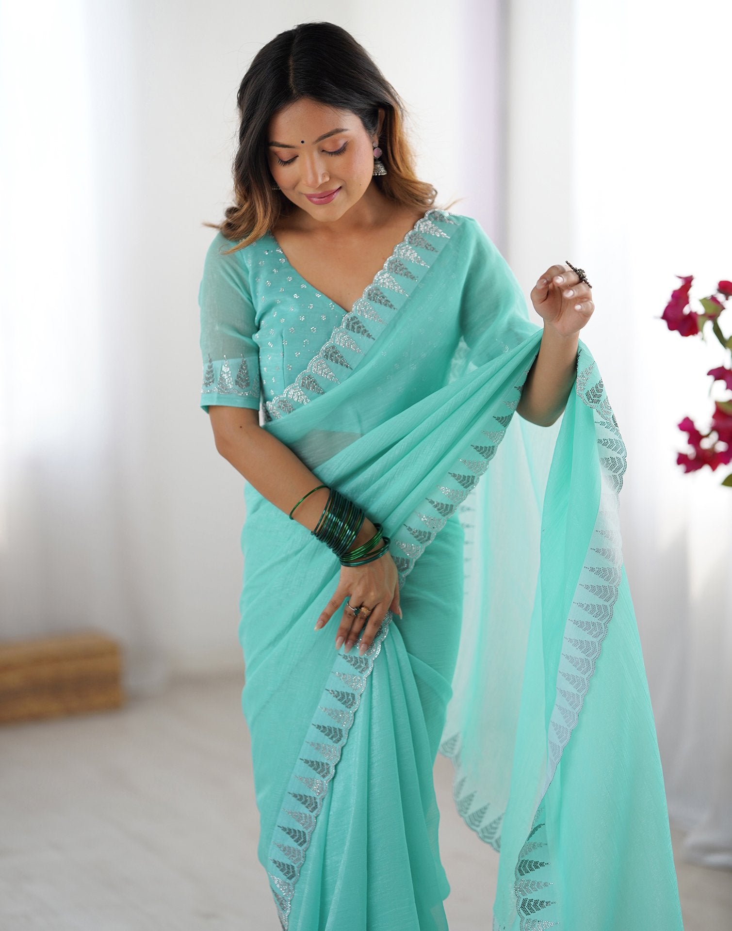 Aqua Blue Shimmer Stone Work Plain Saree