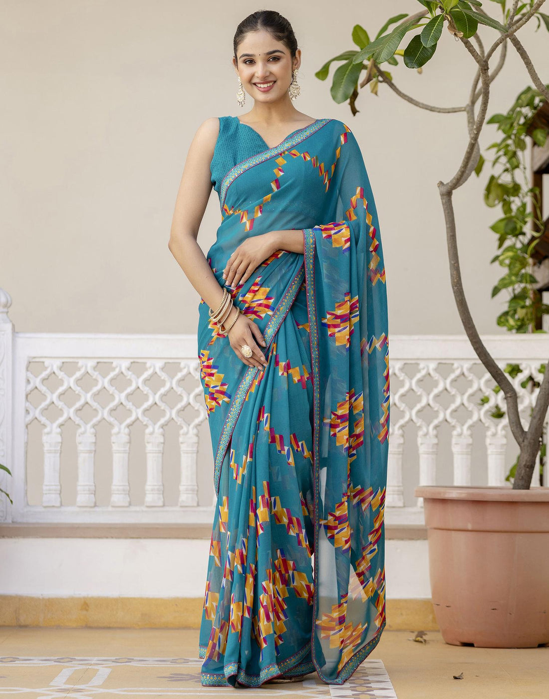 Teal Green Georgette printed Saree
