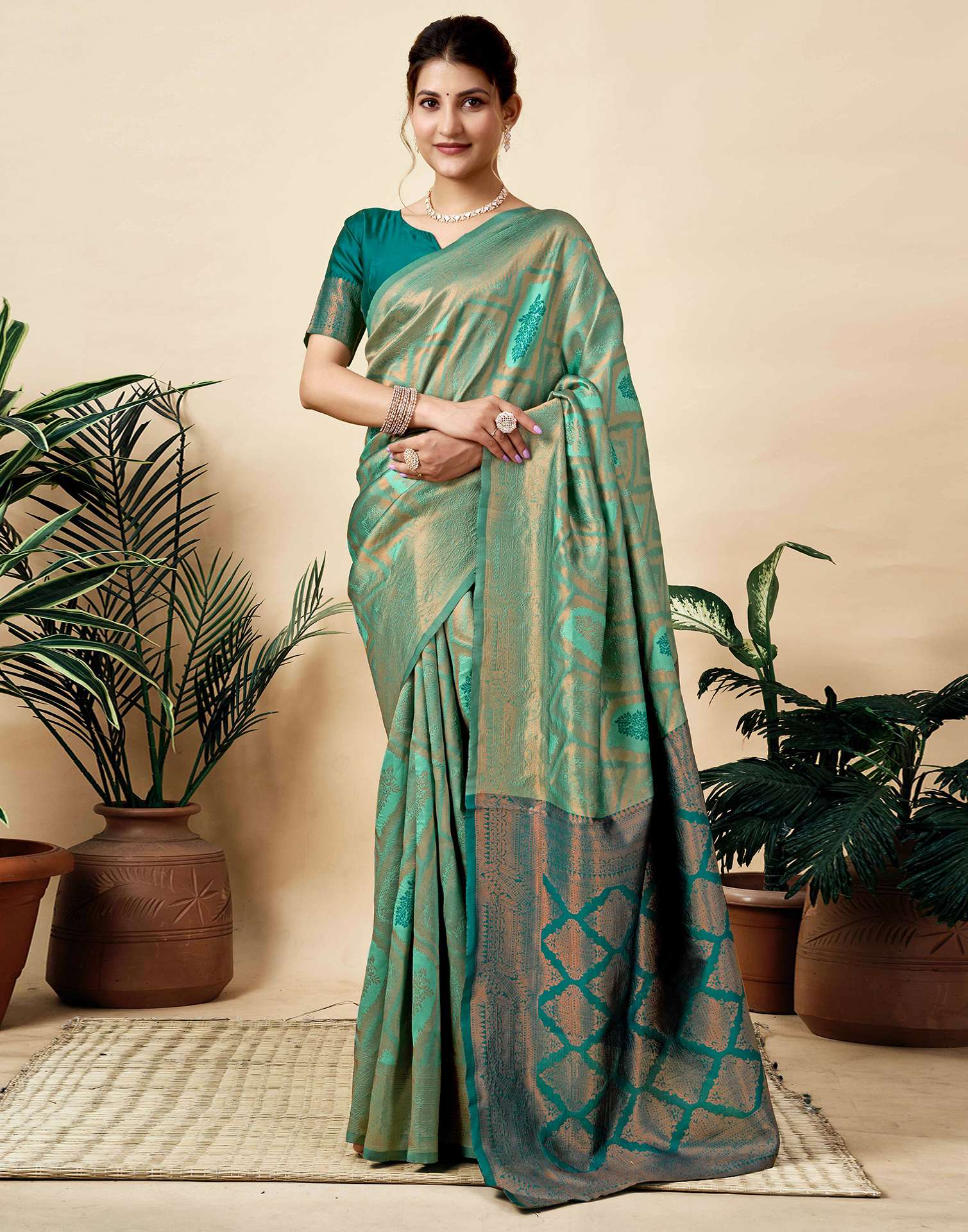 Teal Green Silk Woven Saree