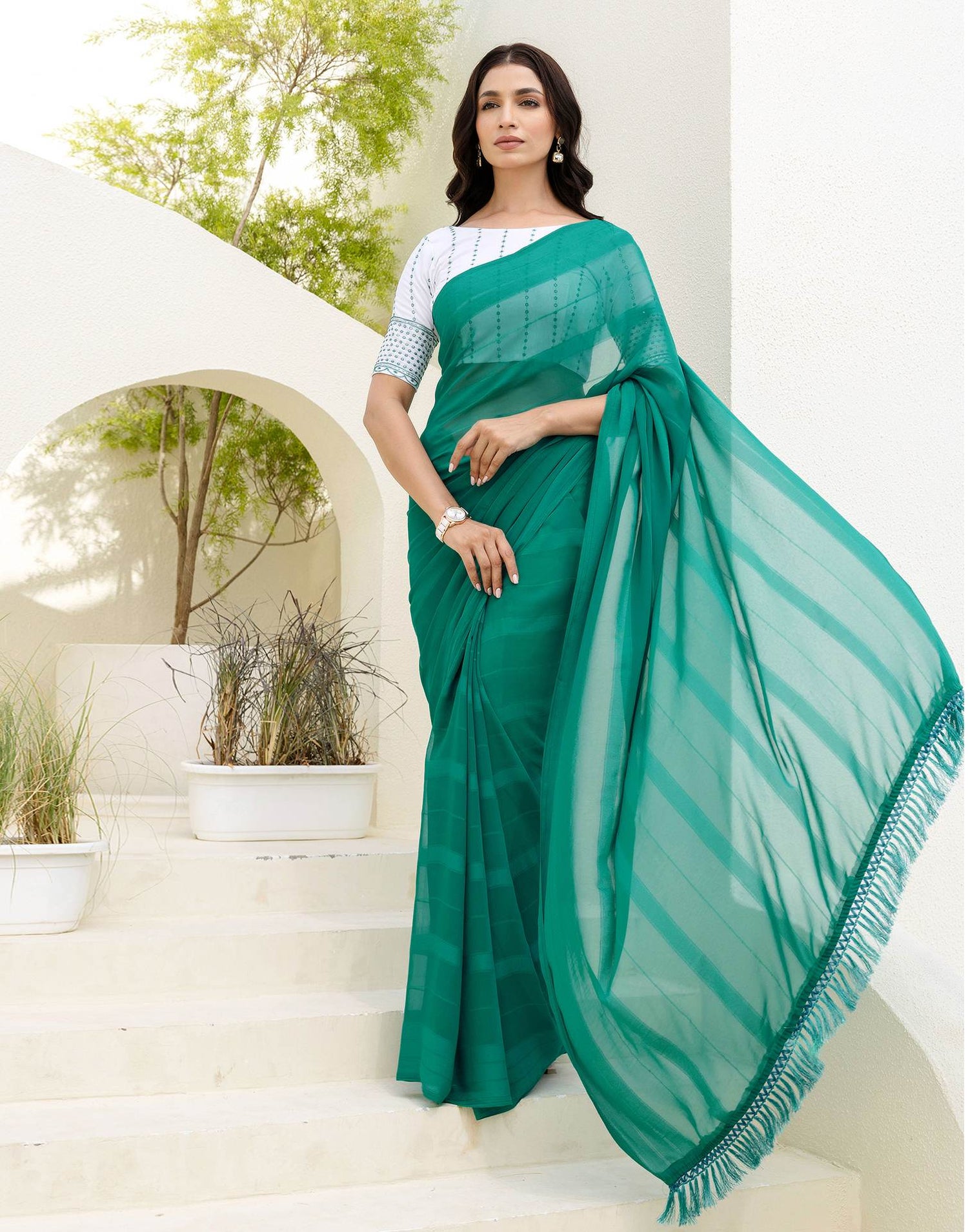 Teal Green Georgette Woven Stripe Plain Saree