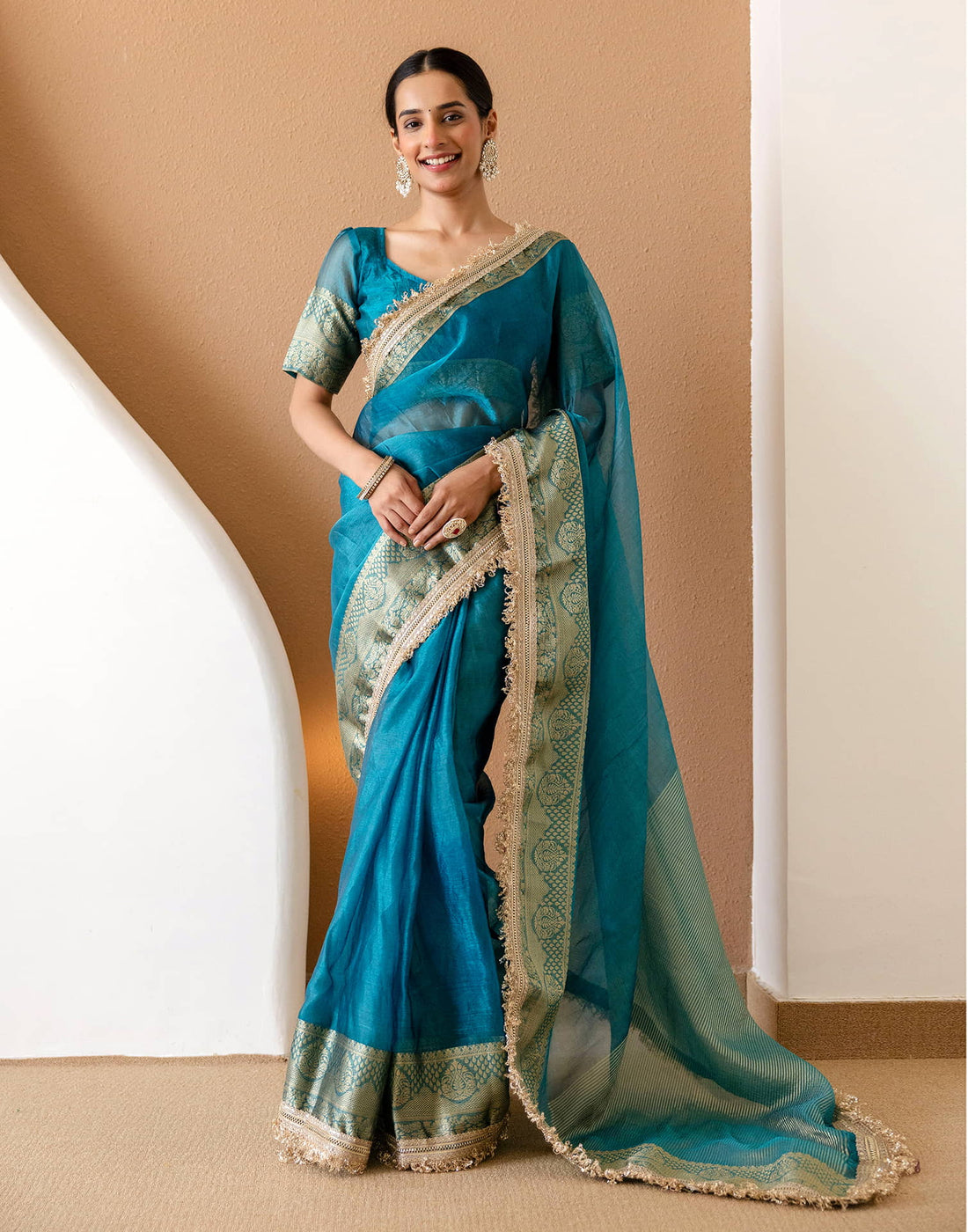 Teal Blue Shimmer Woven Saree