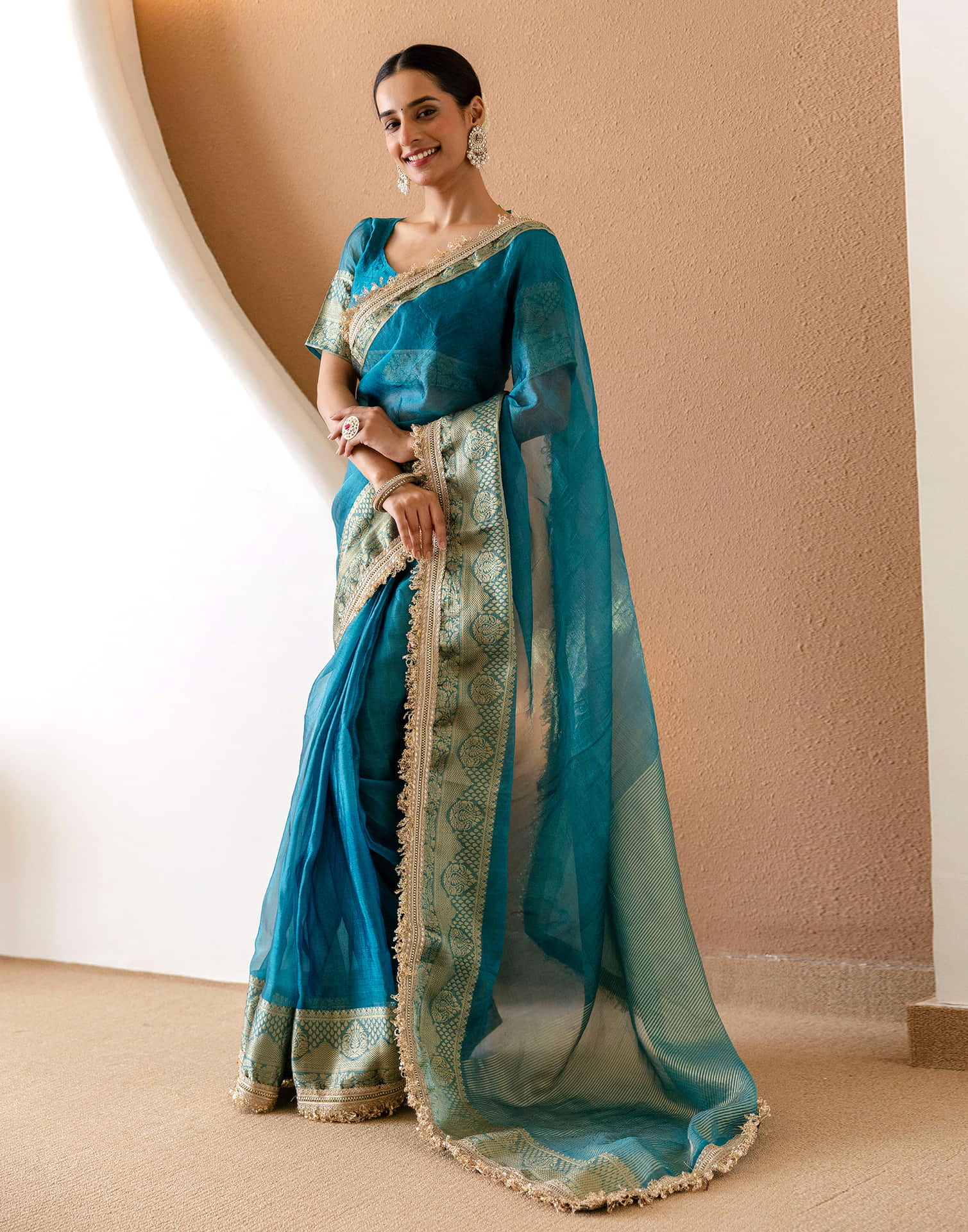 Teal Blue Shimmer Woven Saree