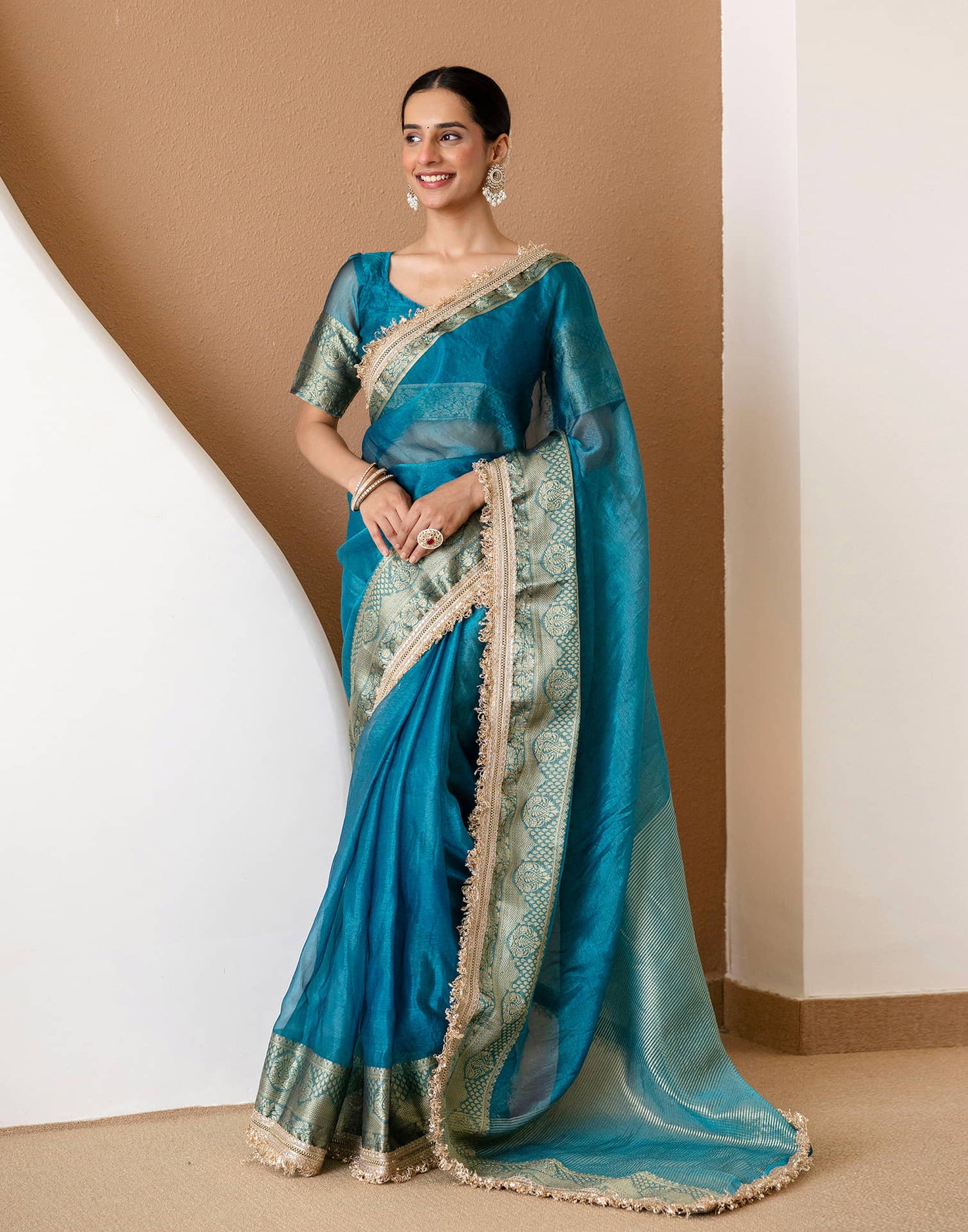 Teal Blue Shimmer Woven Saree