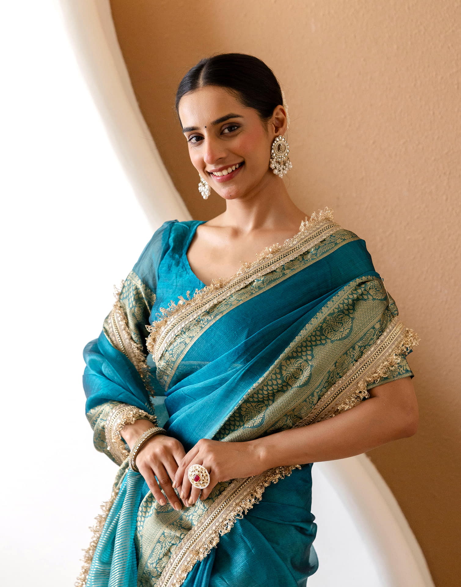Teal Blue Shimmer Woven Saree