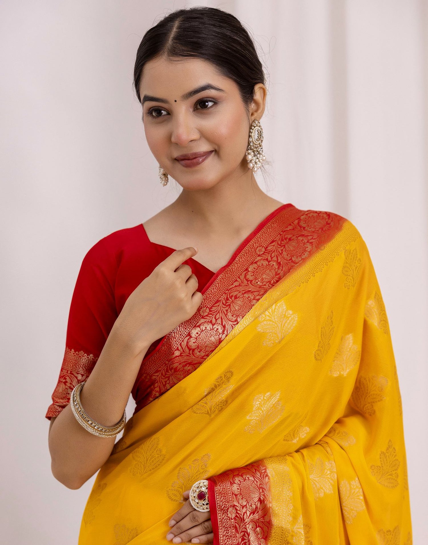 Turmeric Yellow Chiffon Woven Saree