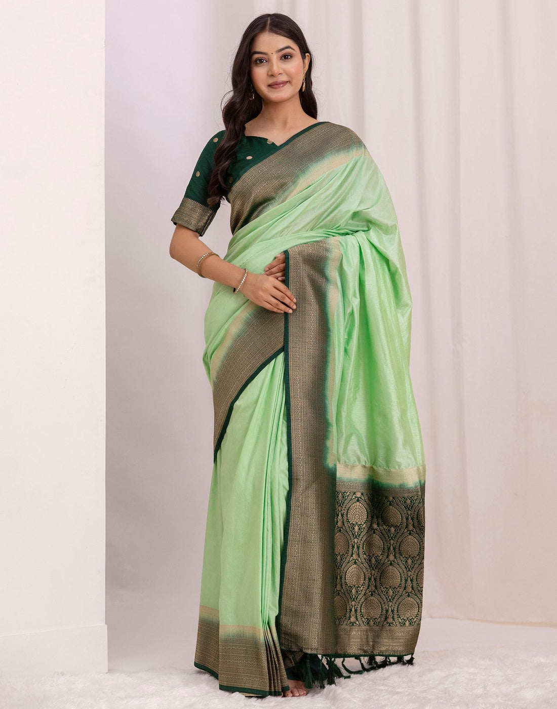 Pista Green Silk Woven Saree