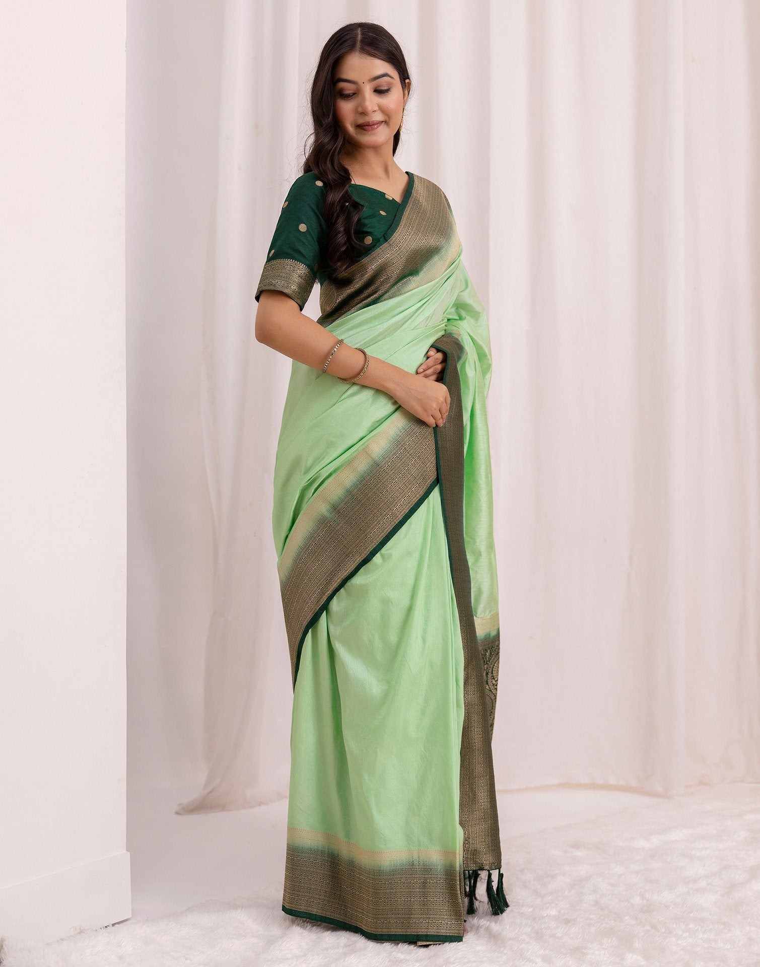 Pista Green Silk Woven Saree