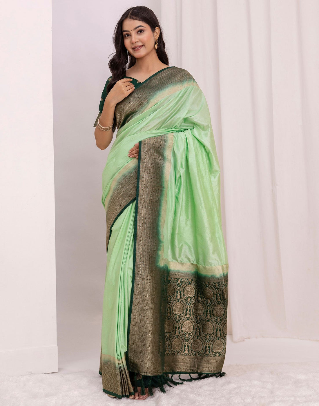 Pista Green Silk Woven Saree