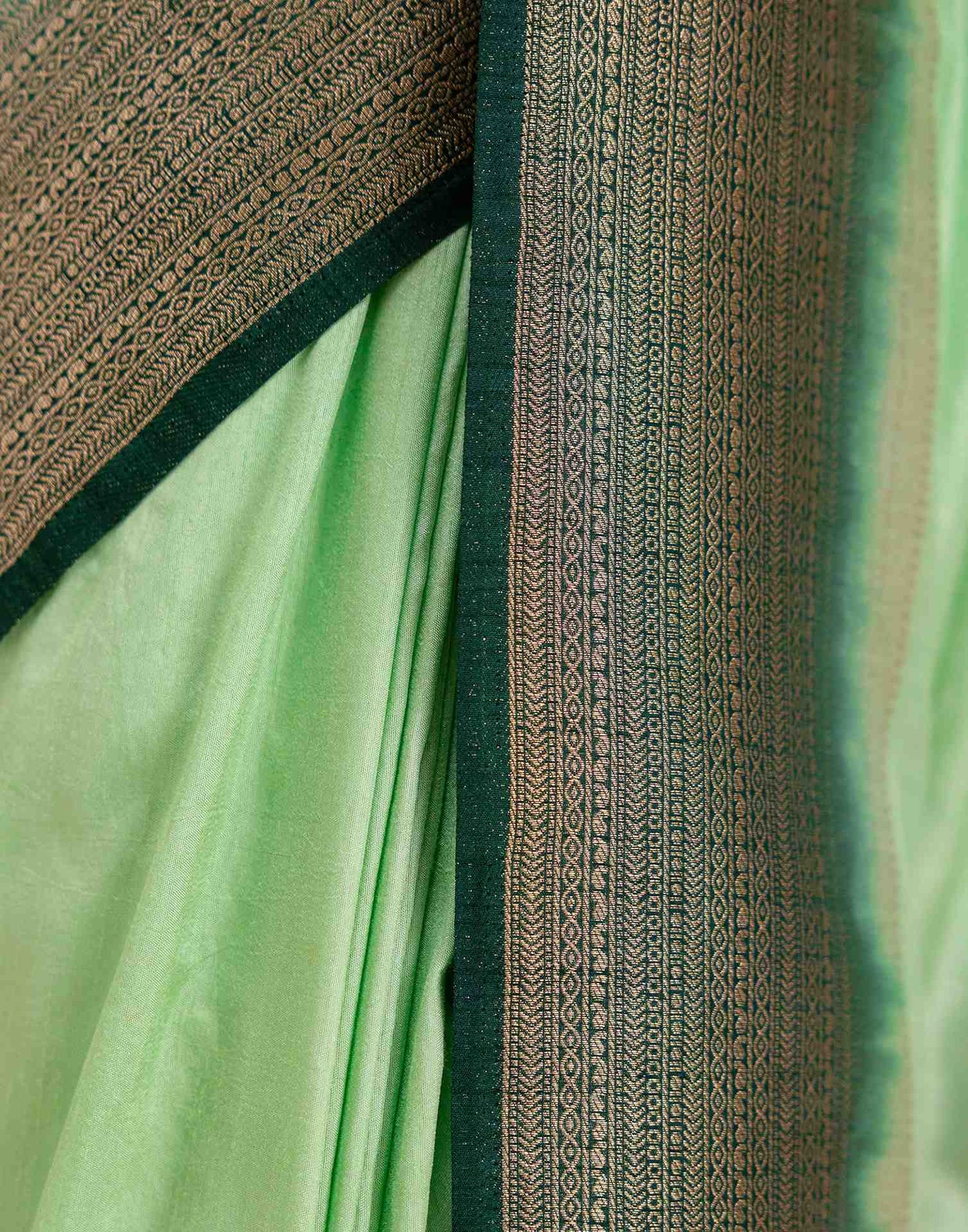 Pista Green Silk Woven Saree