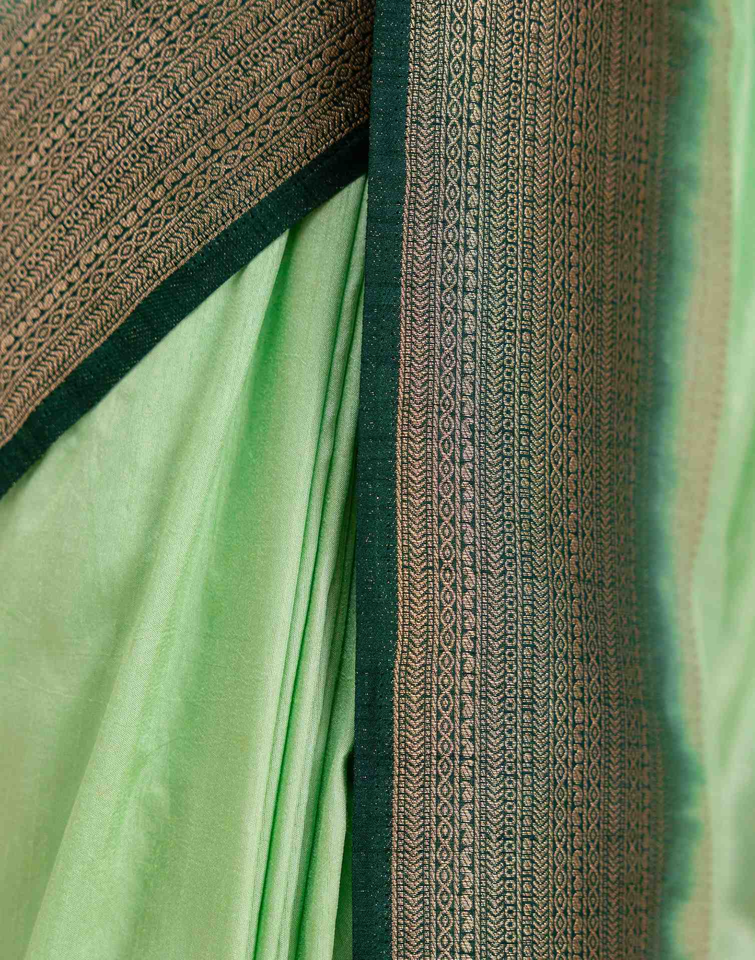 Pista Green Silk Woven Saree