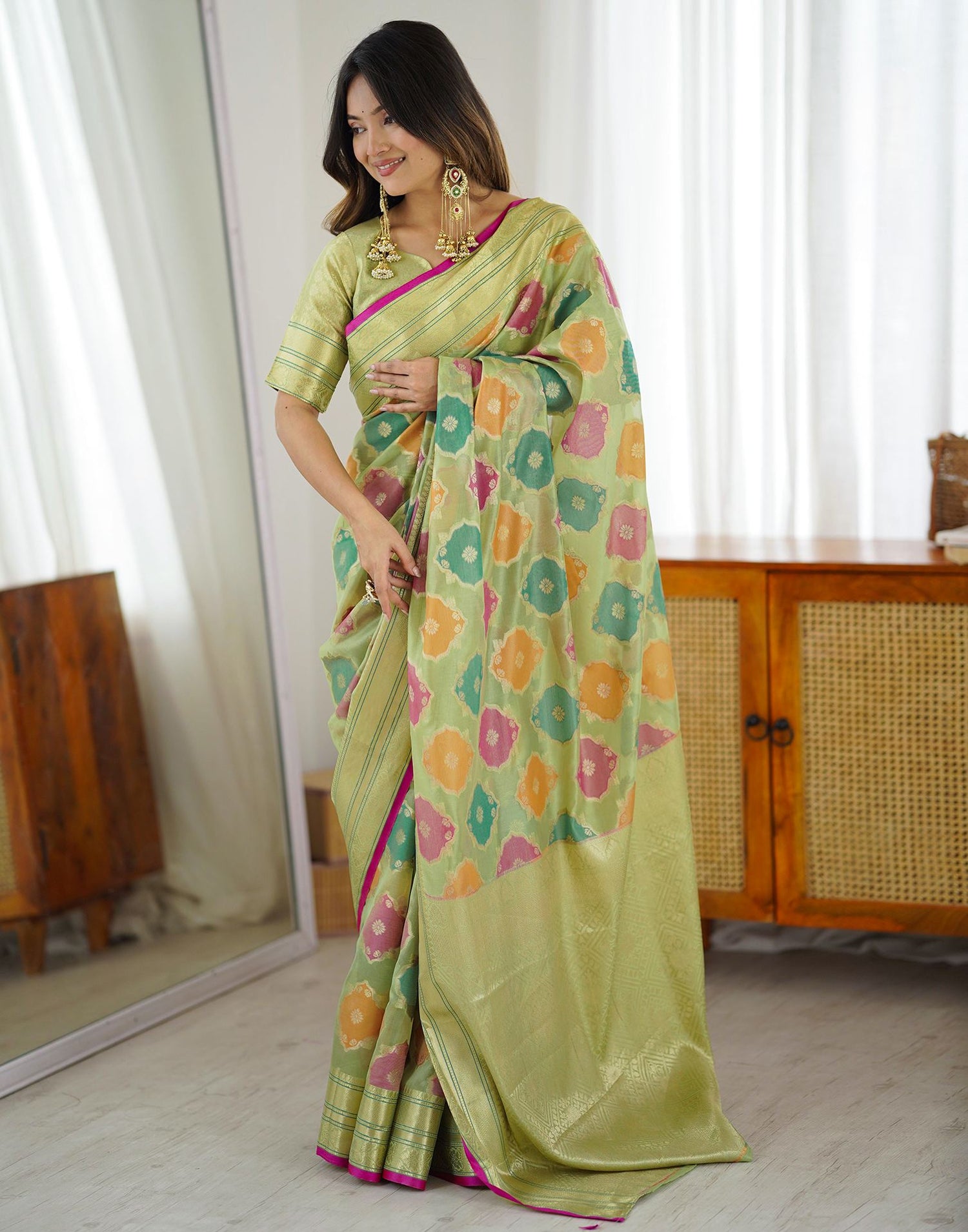 Pista Green Silk Woven Saree