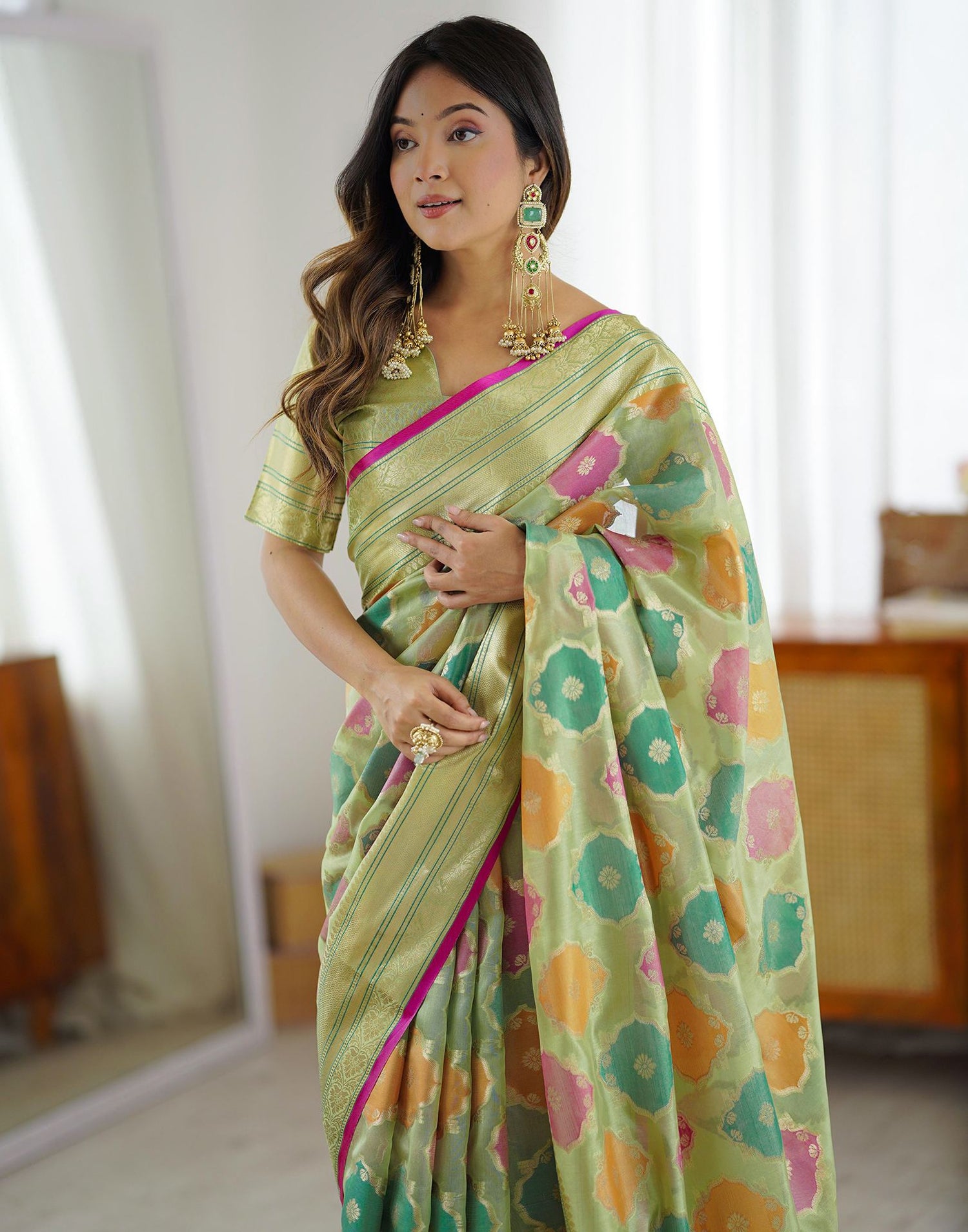Pista Green Silk Woven Saree