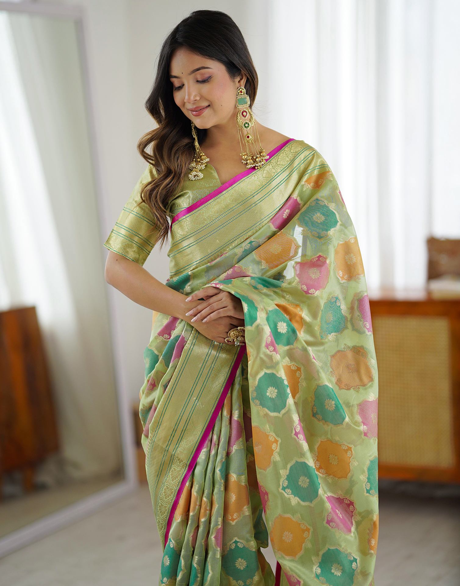 Pista Green Silk Woven Saree
