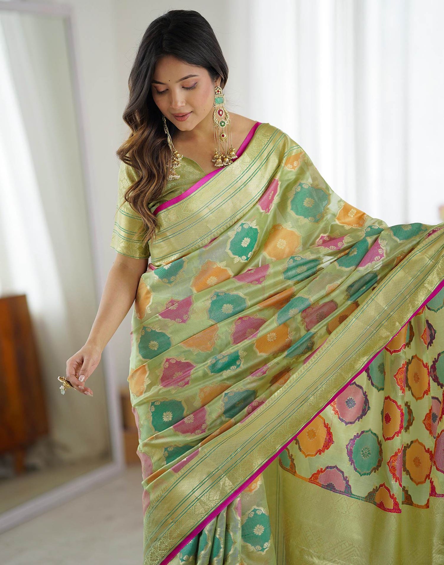 Pista Green Silk Woven Saree