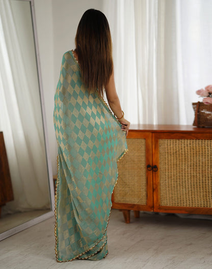 Teal Green Shimmer Woven Saree