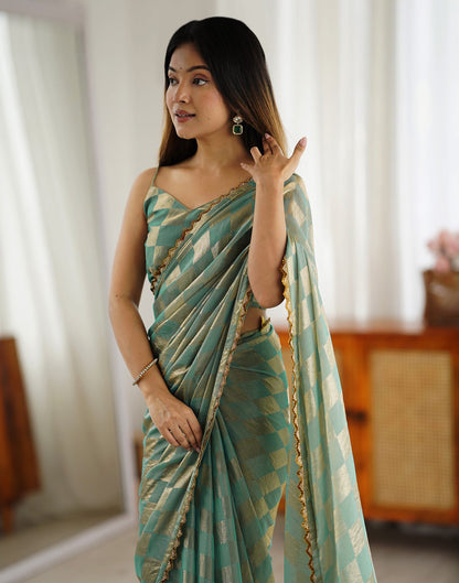Teal Green Shimmer Woven Saree