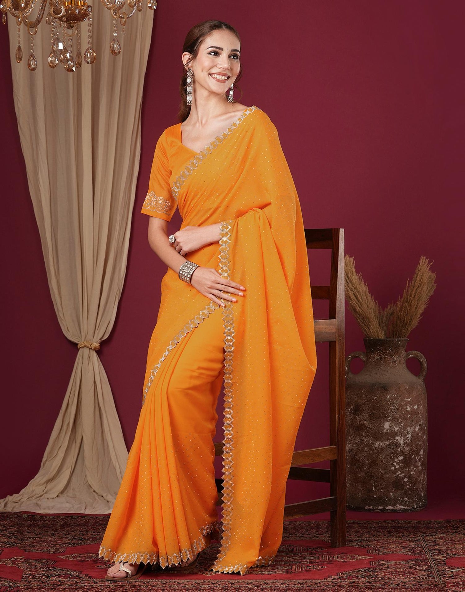 Yellow Georgette Stone Work Swarovski Saree