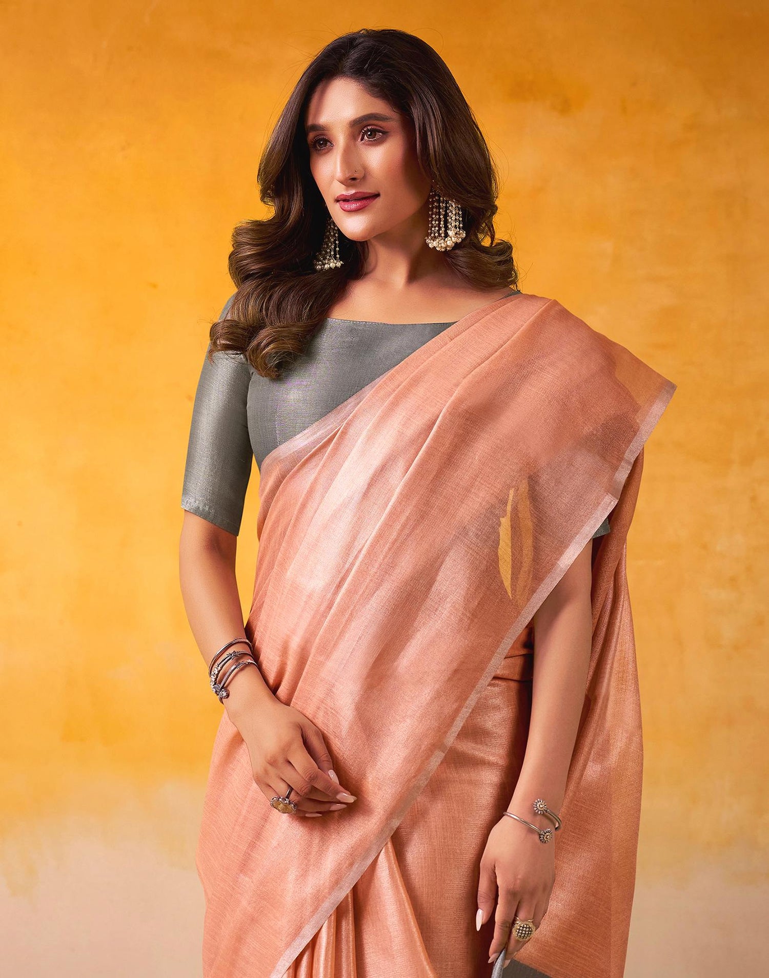 Peach Tissue Silk Woven Saree