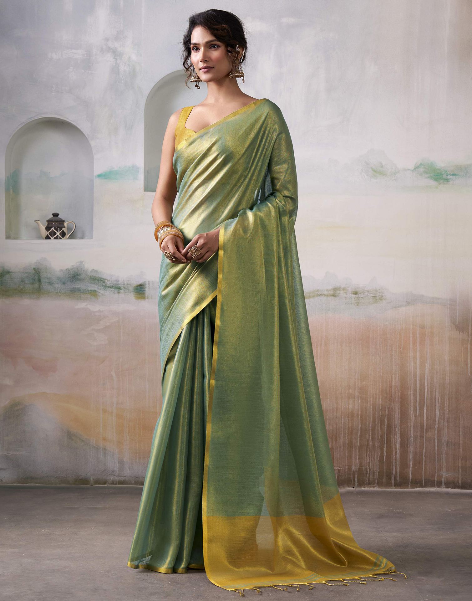Teal Green Tissue Silk Woven Plain Saree