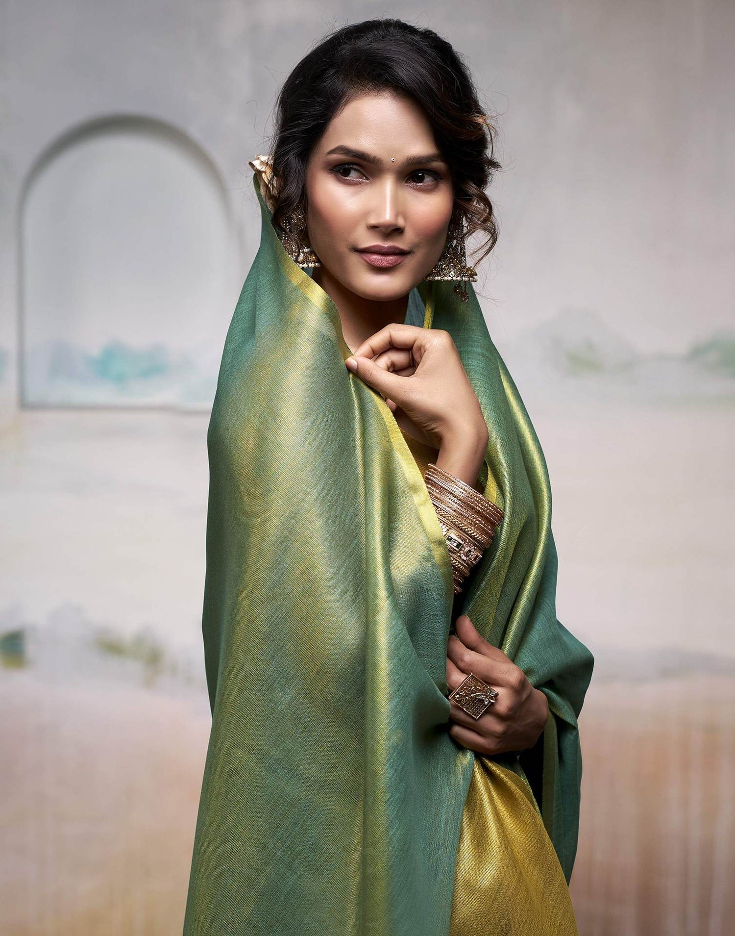 Teal Green Tissue Silk Woven Plain Saree