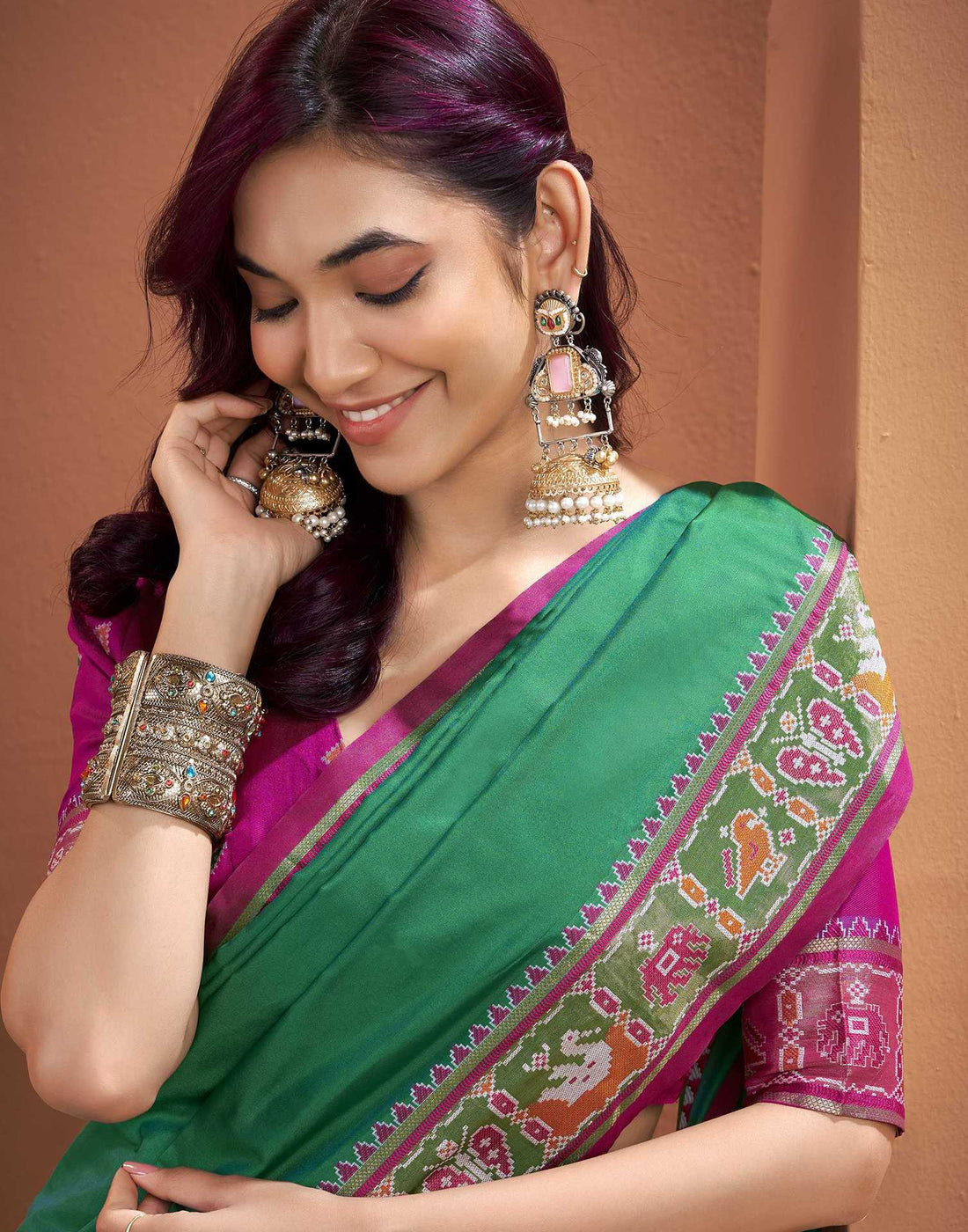 Teal Green Silk Woven Patola Saree