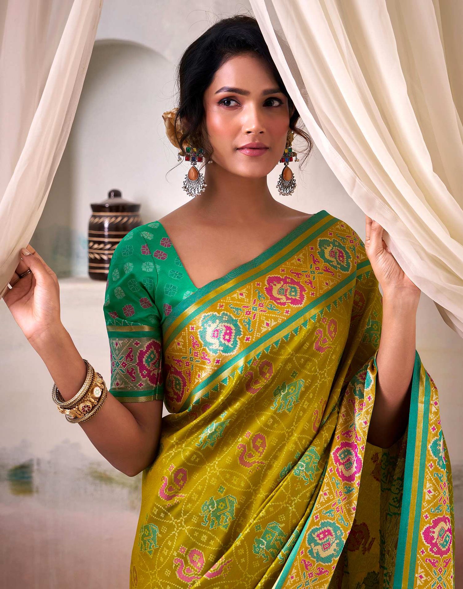 Mustard Green Silk Woven Patola Saree