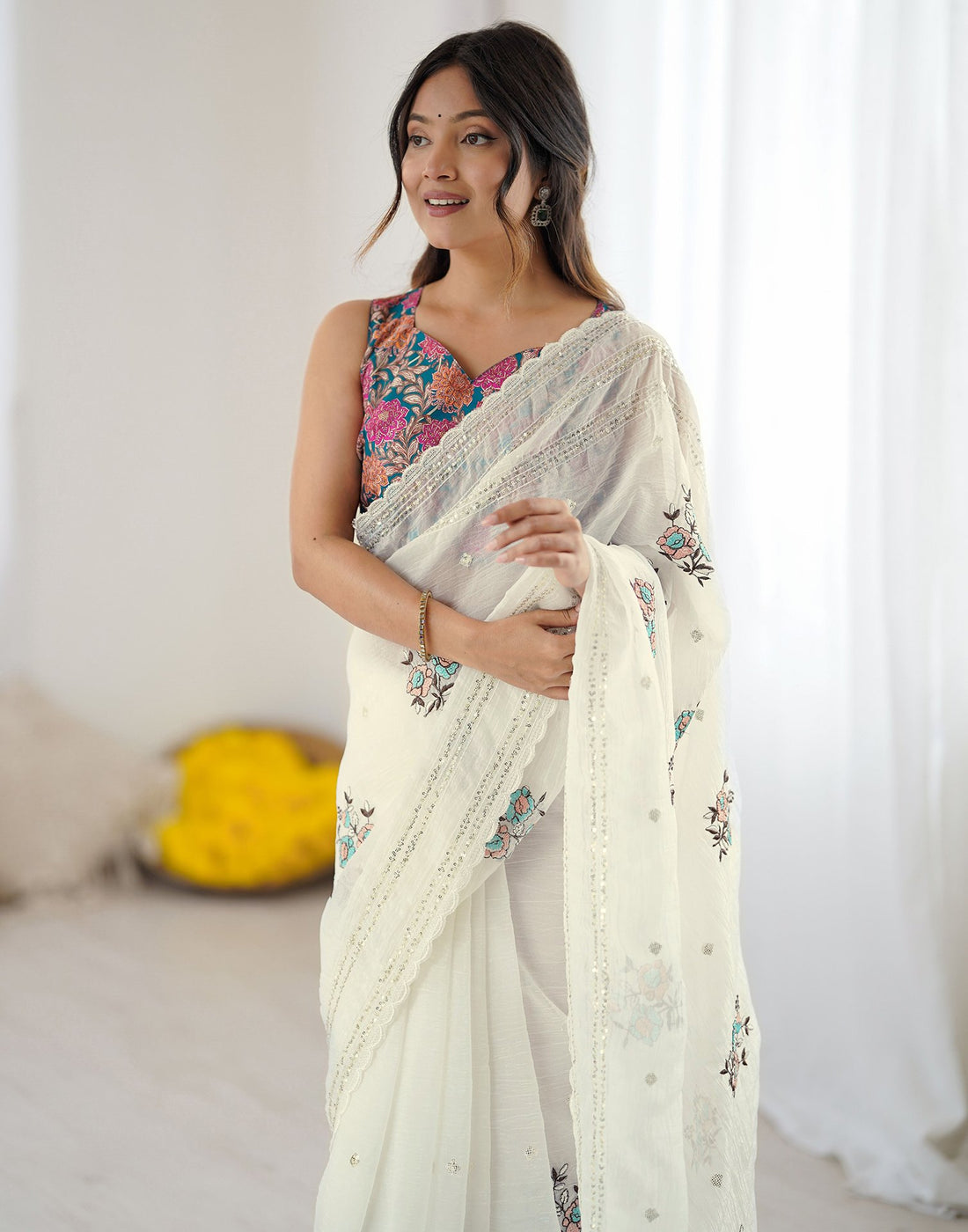 Off White Tissue Silk Sequence Embroidery Saree