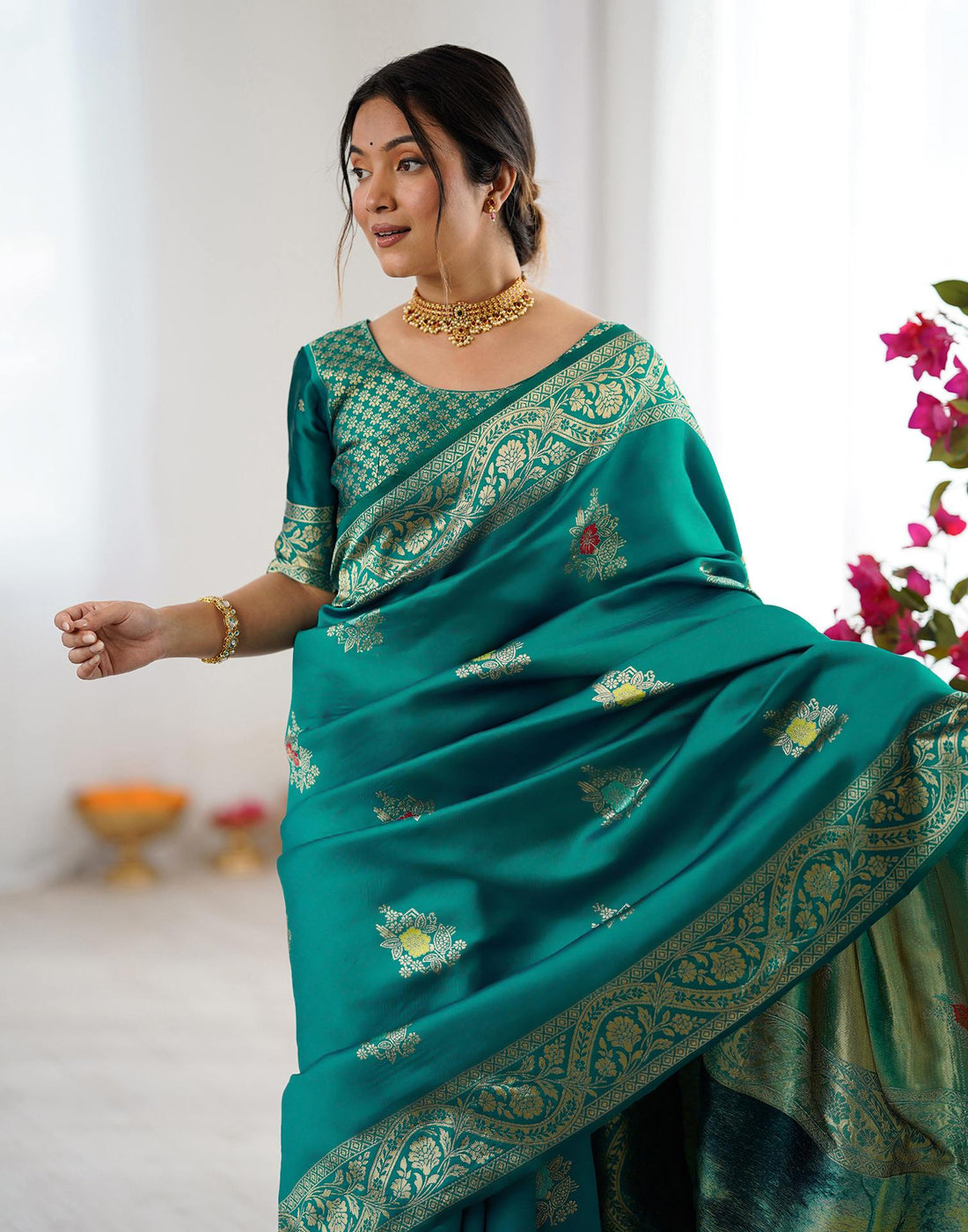 Teal Green Silk Woven Saree