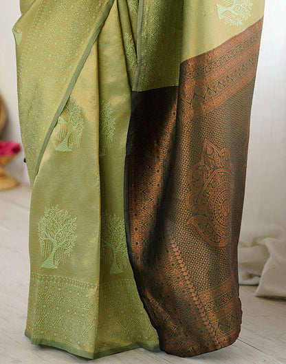 Pista Green Silk Woven Saree