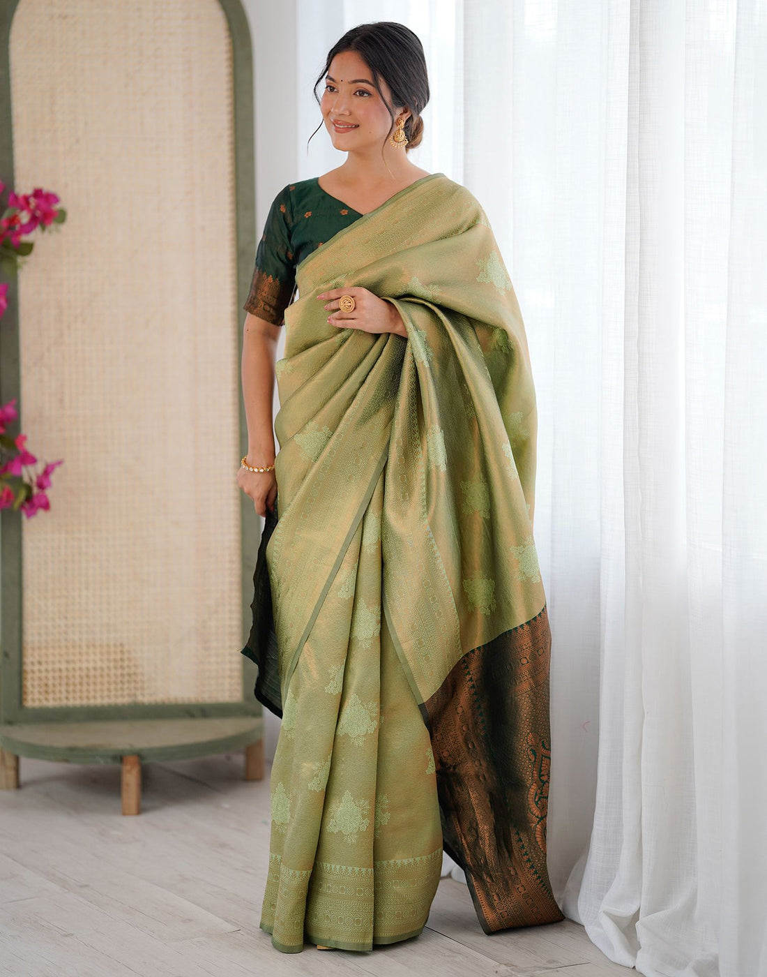 Pista Green Silk Woven Saree