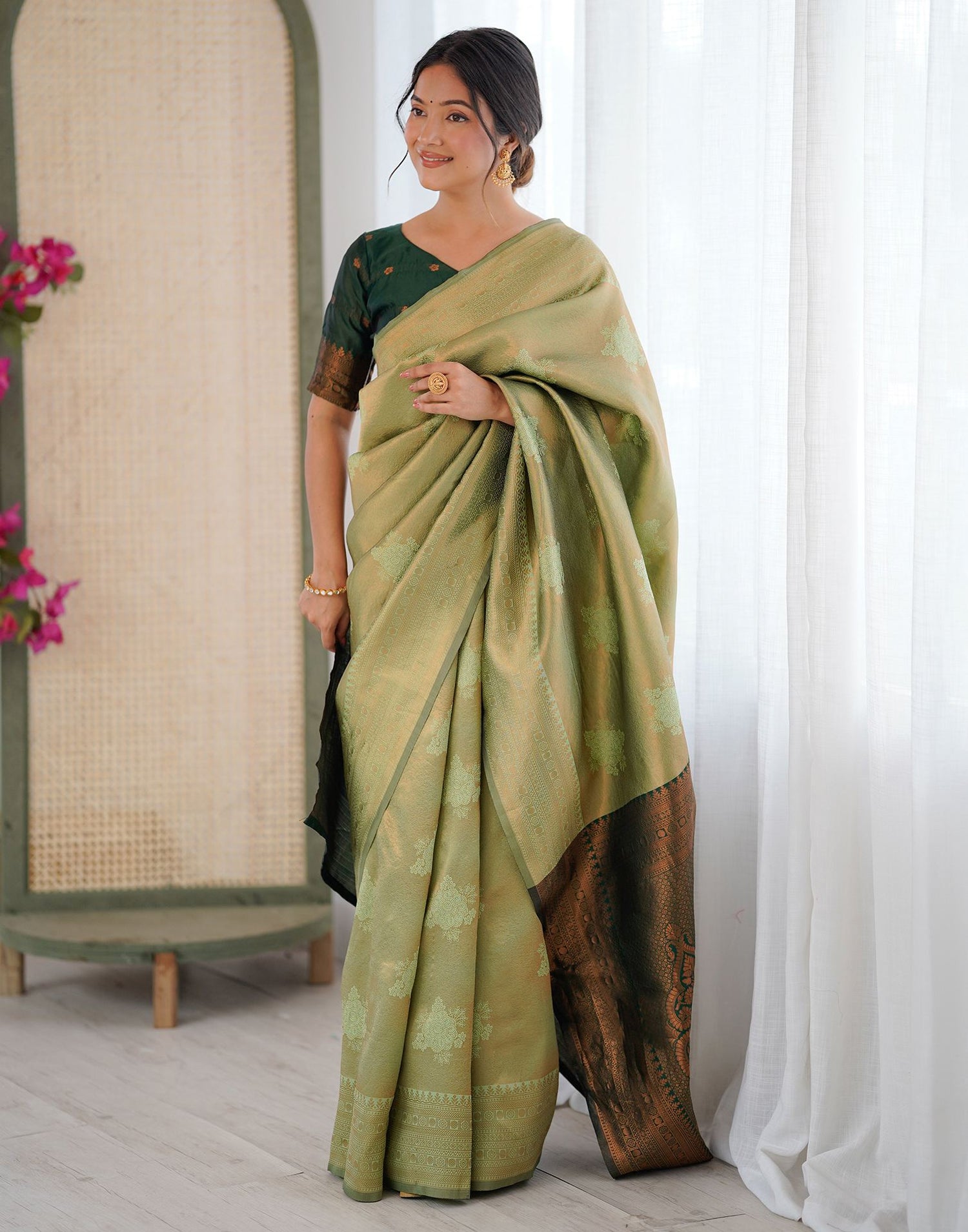Pista Green Silk Woven Saree