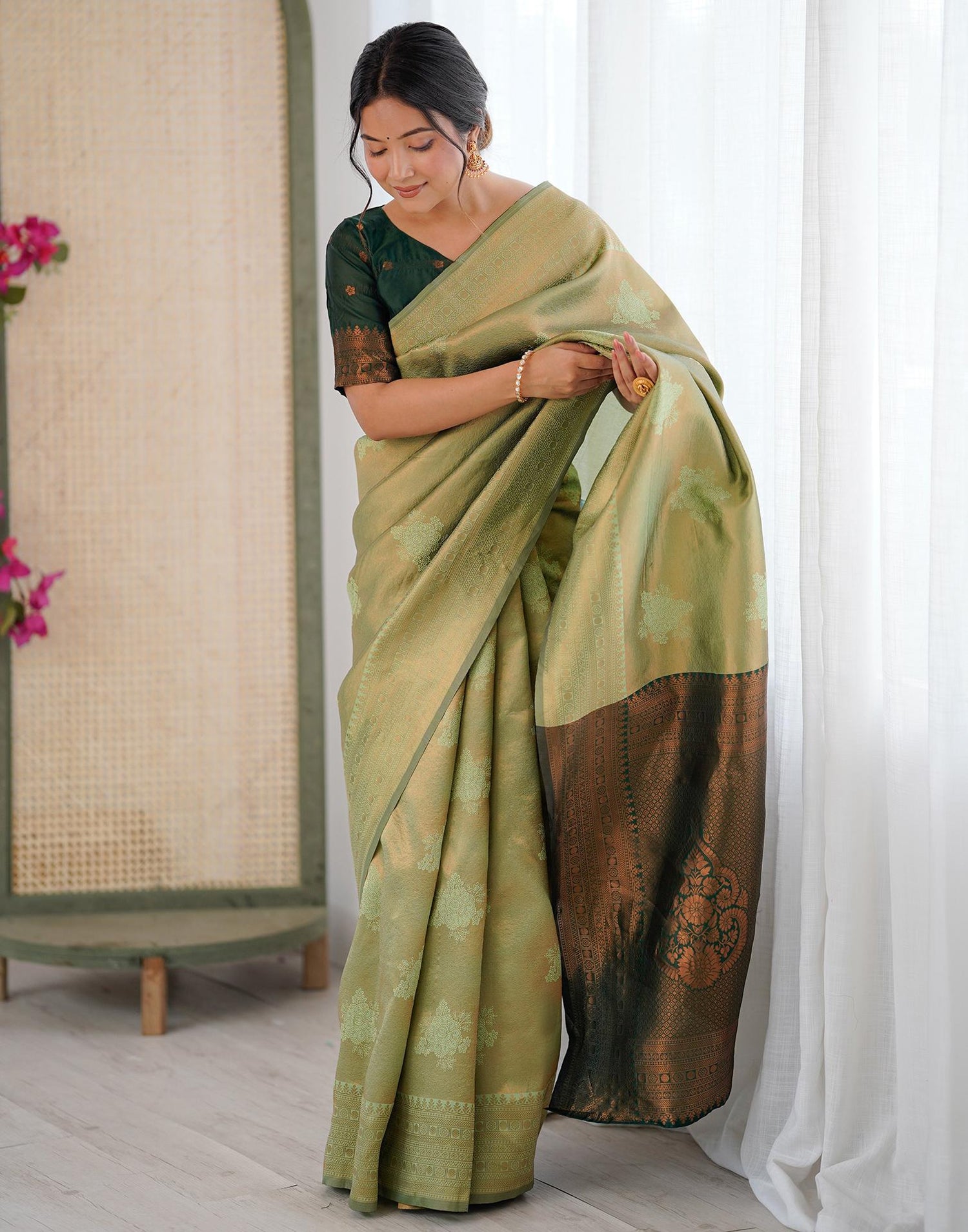Pista Green Silk Woven Saree
