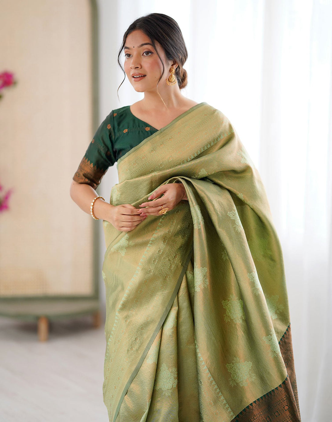 Pista Green Silk Woven Saree