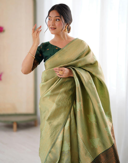 Pista Green Silk Woven Saree