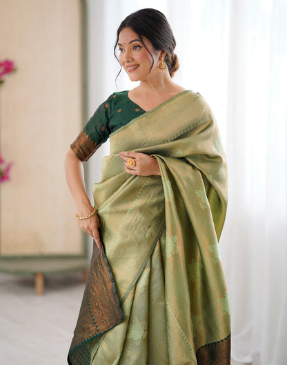 Pista Green Silk Woven Saree