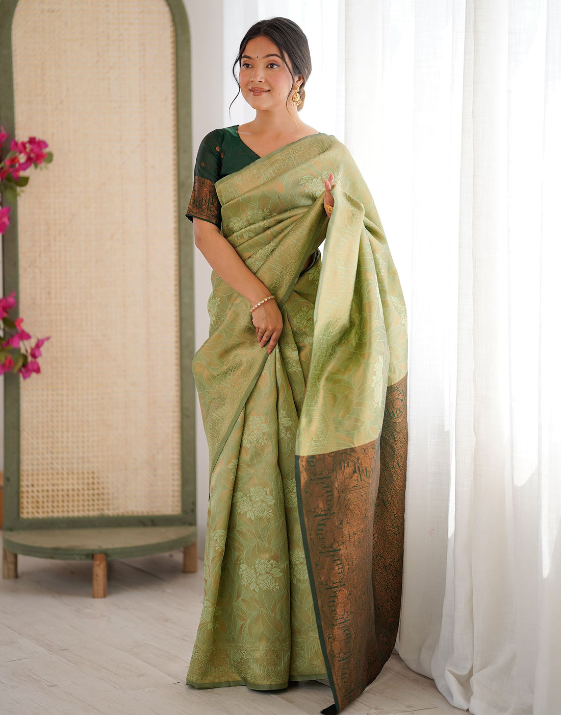 Pista Green Silk Woven Saree