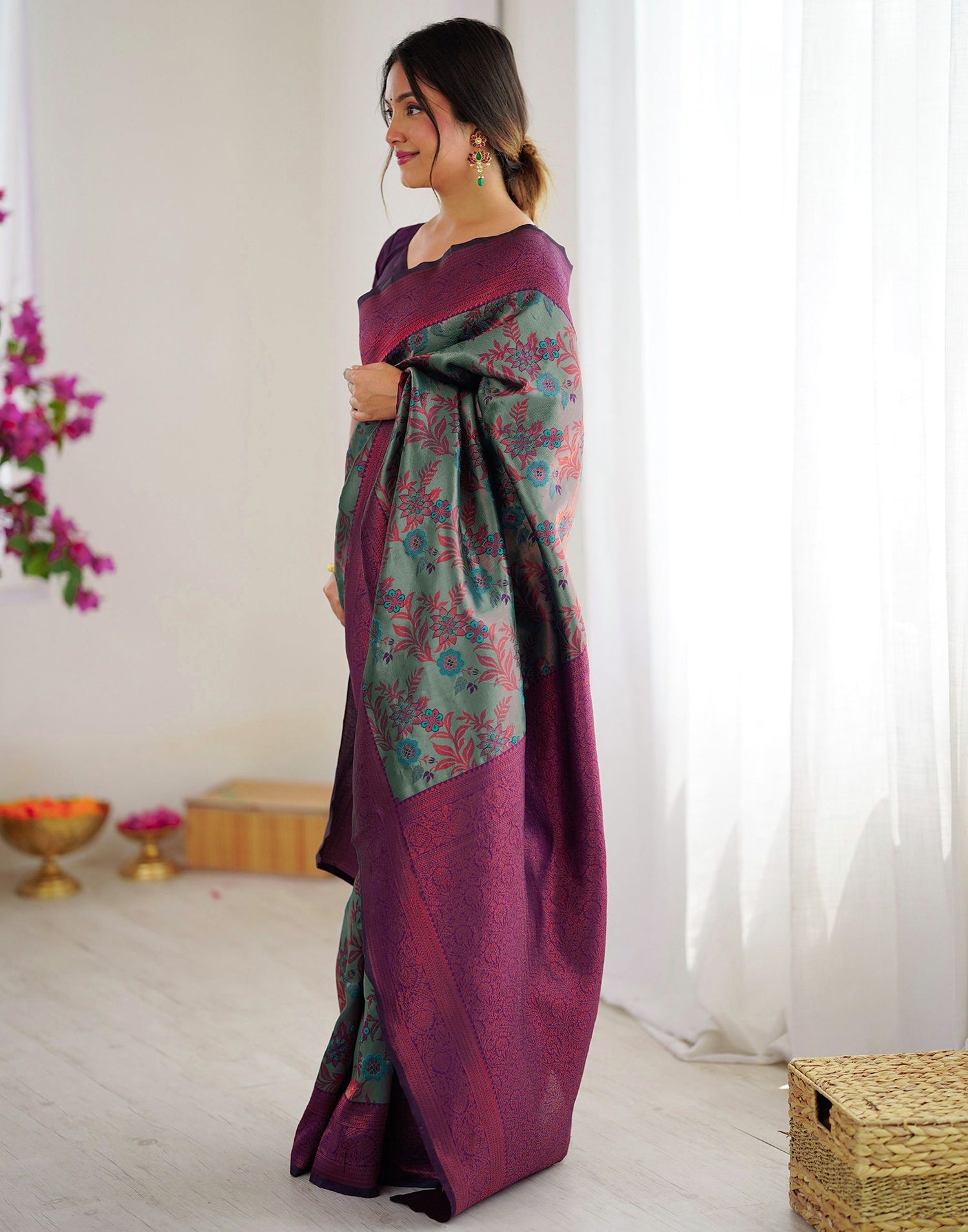 Teal Green Silk Woven Saree