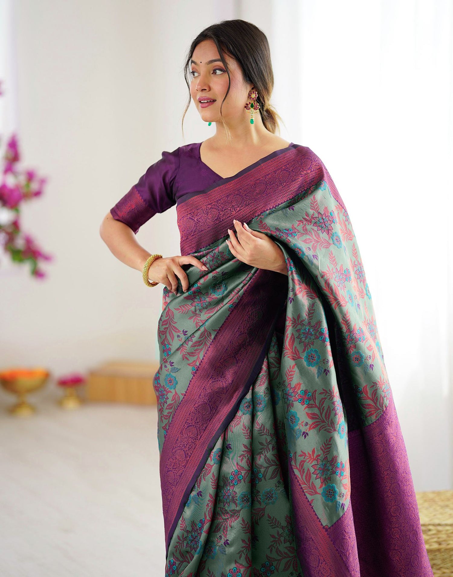 Teal Green Silk Woven Saree