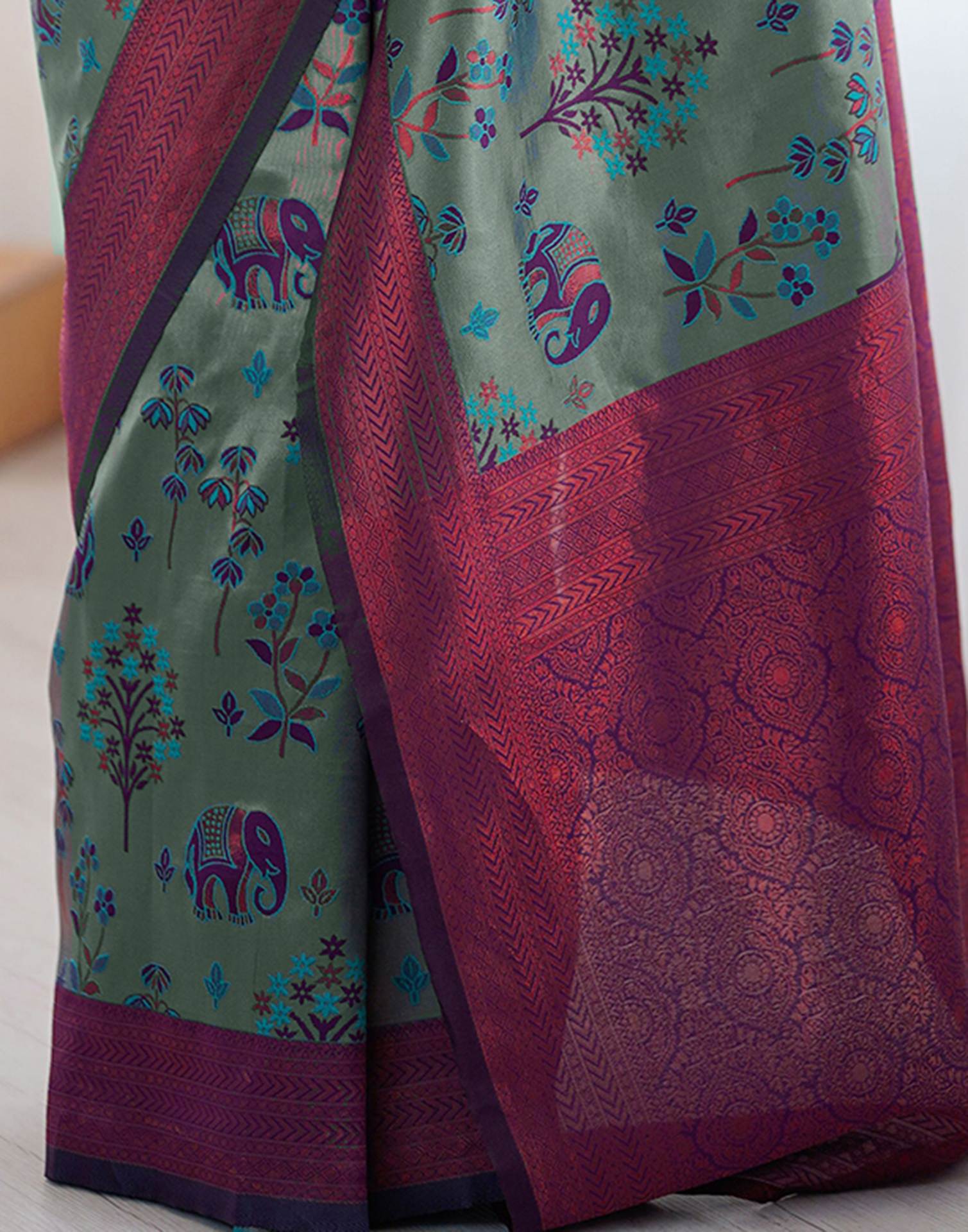 Teal Green Silk Woven Saree