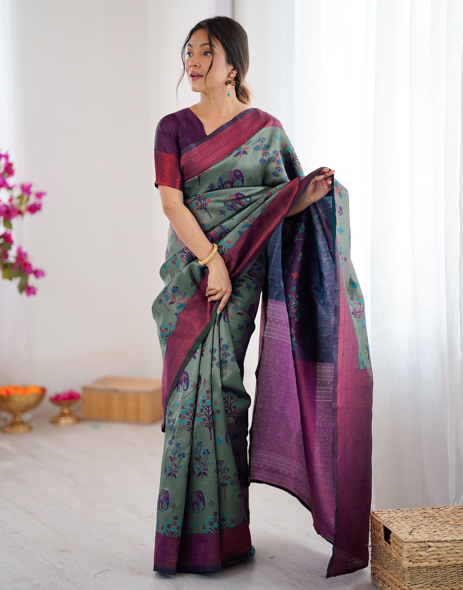 Teal Green Silk Woven Saree