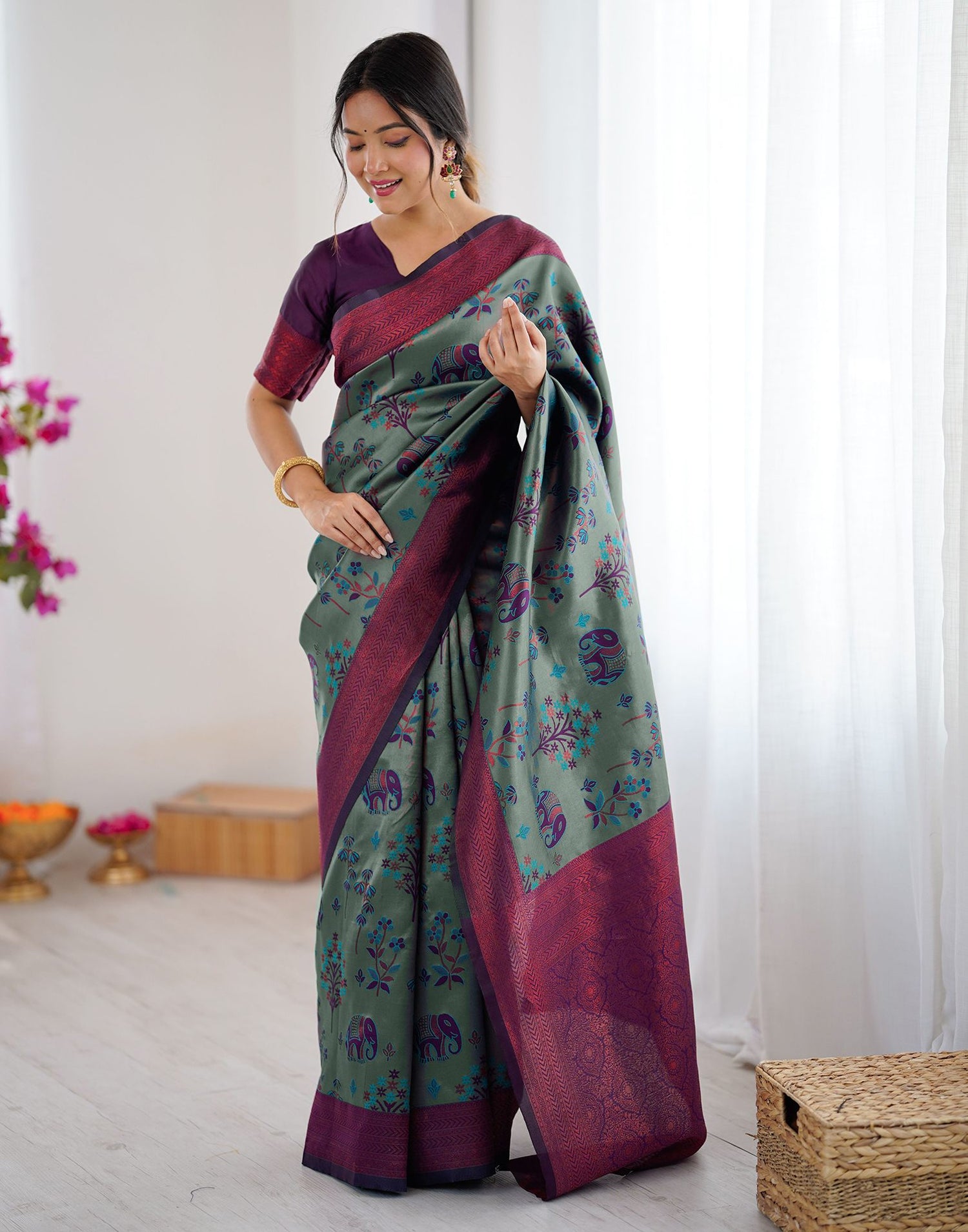 Teal Green Silk Woven Saree