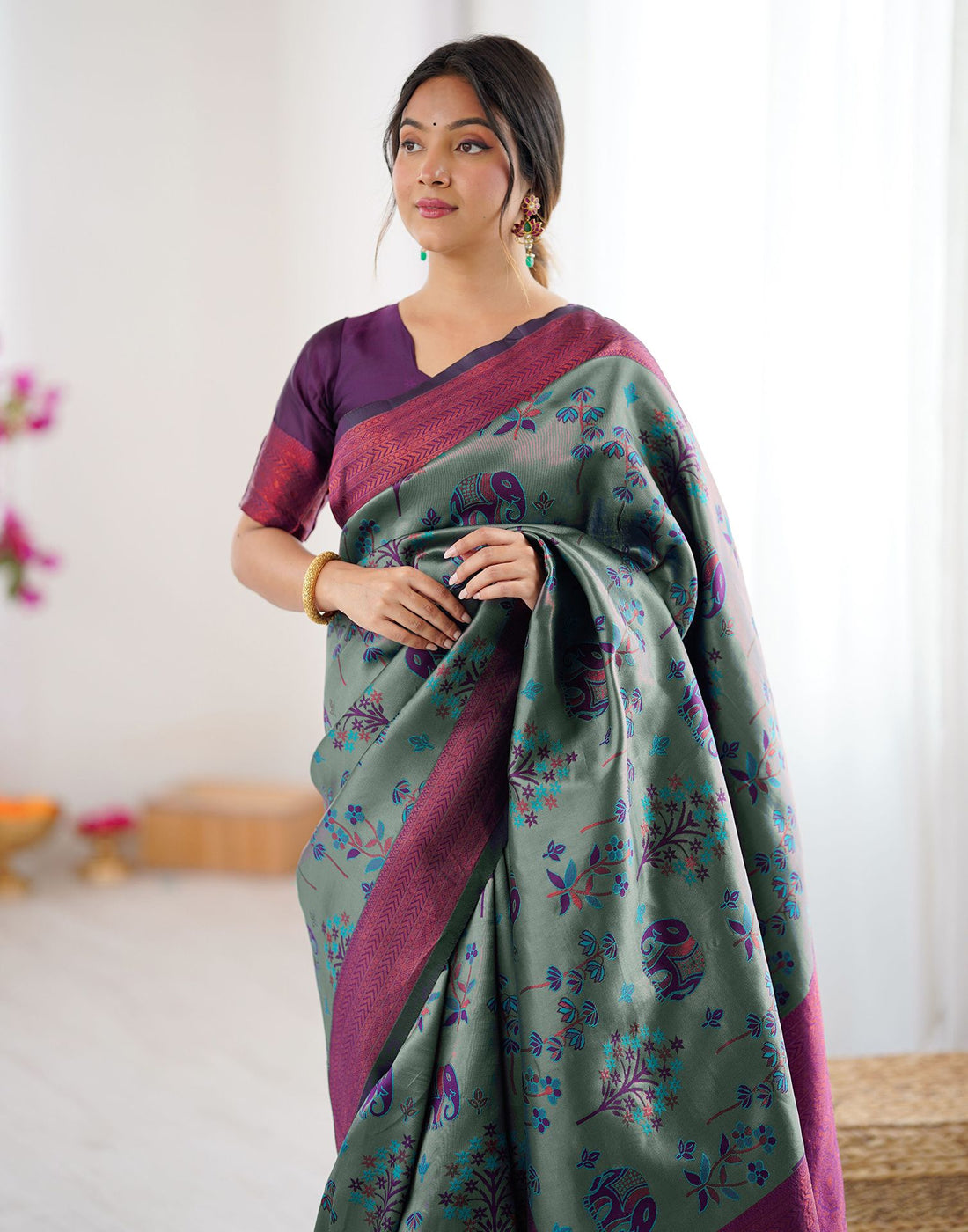 Teal Green Silk Woven Saree
