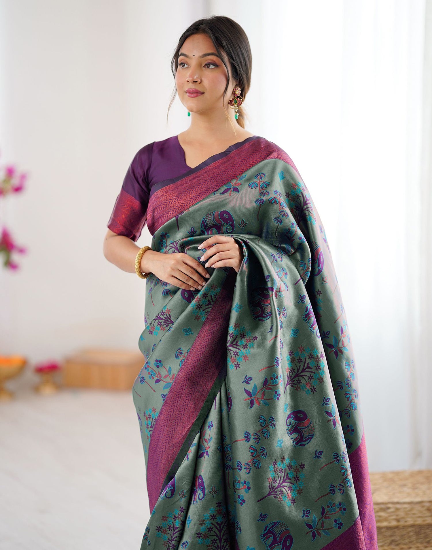 Teal Green Silk Woven Saree