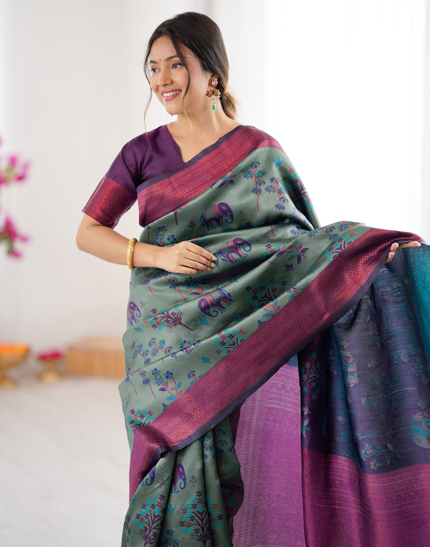 Teal Green Silk Woven Saree