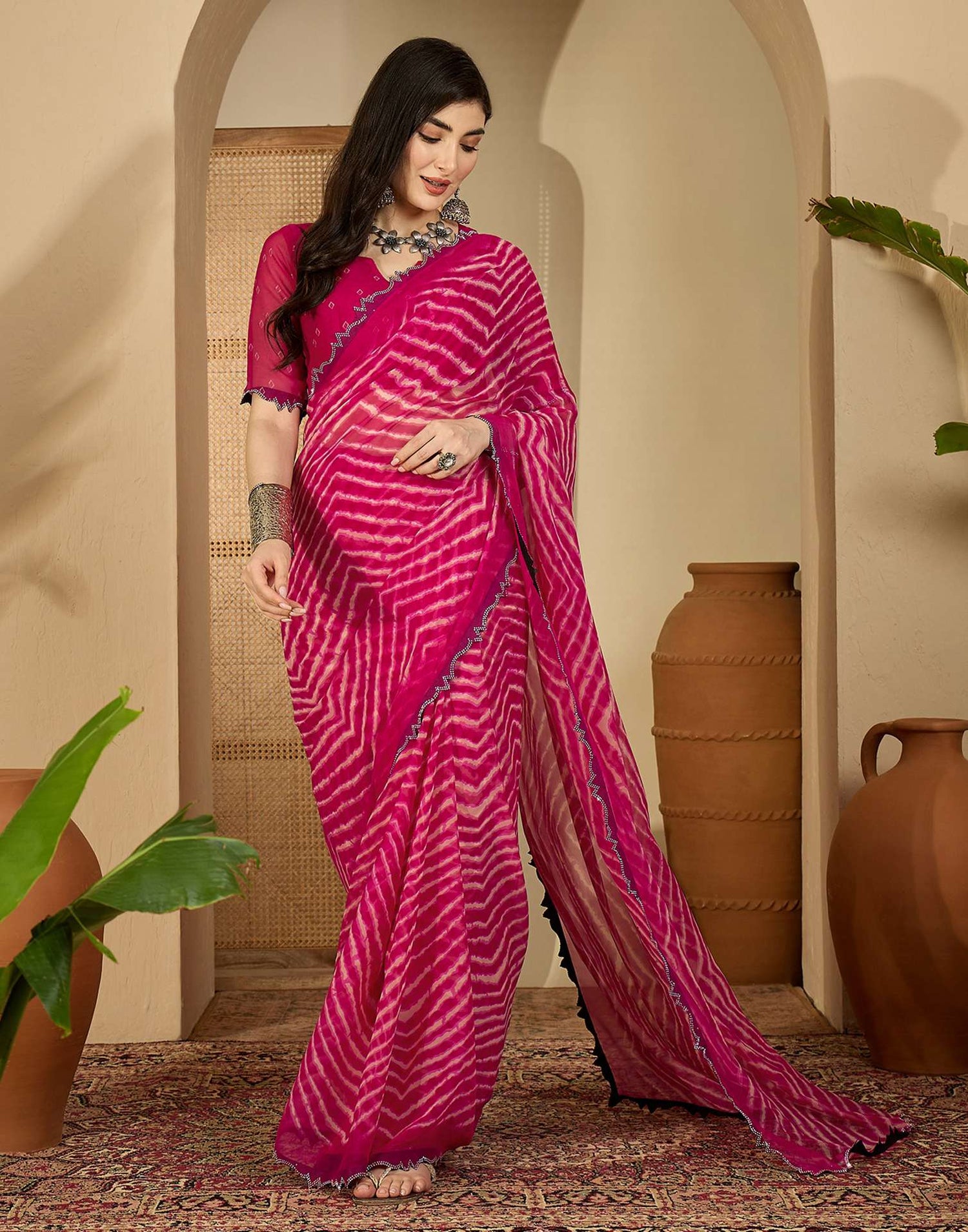 Pink Georgette Printed Laheriya Saree